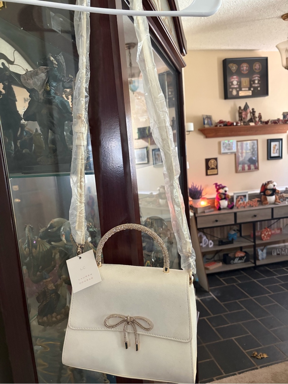 Elegant Cream Top-Handle Crossbody Bag with Bow Accent